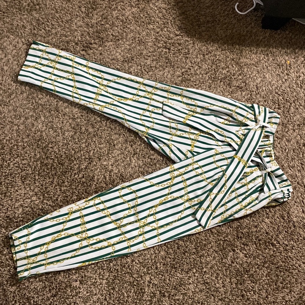 Like An Angel green, white, and gold pants